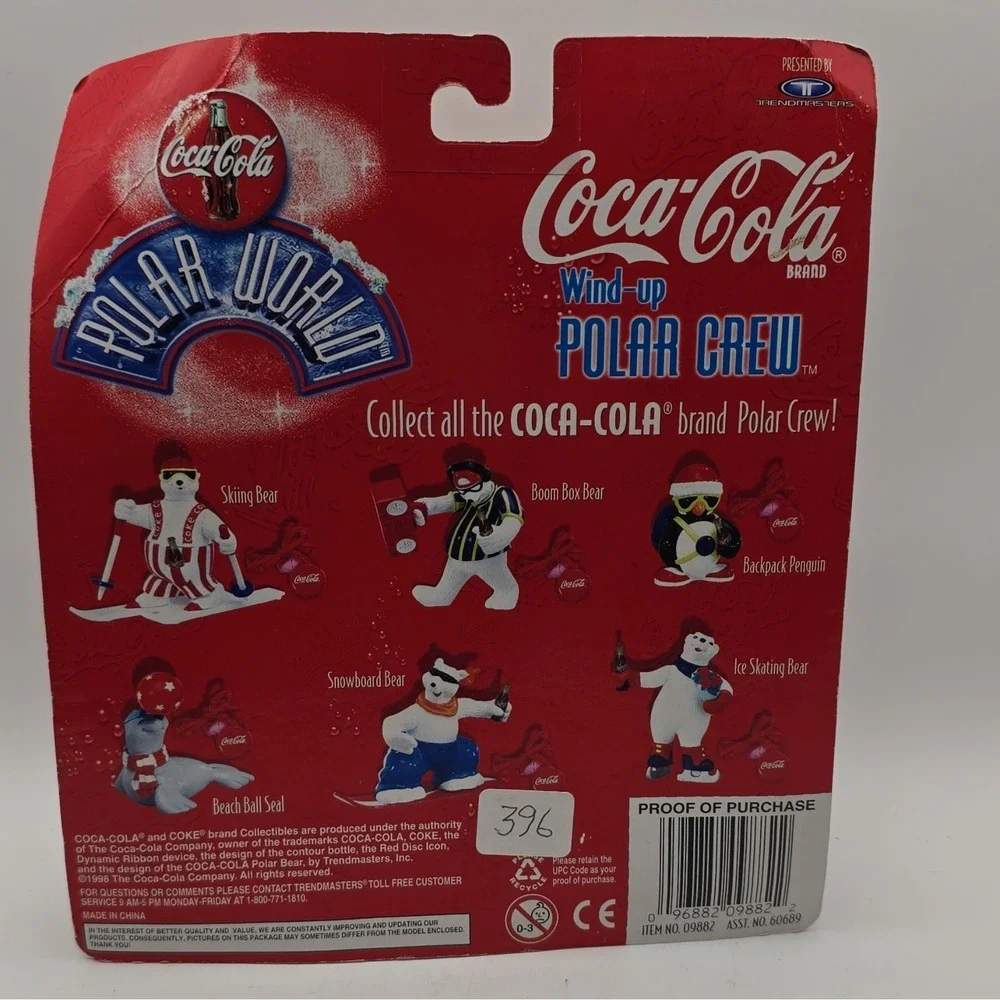Coca-Cola Polar Crew Wind-Up Skiing Bear w/ Magnetic Skis Bottle Cap Key 1996